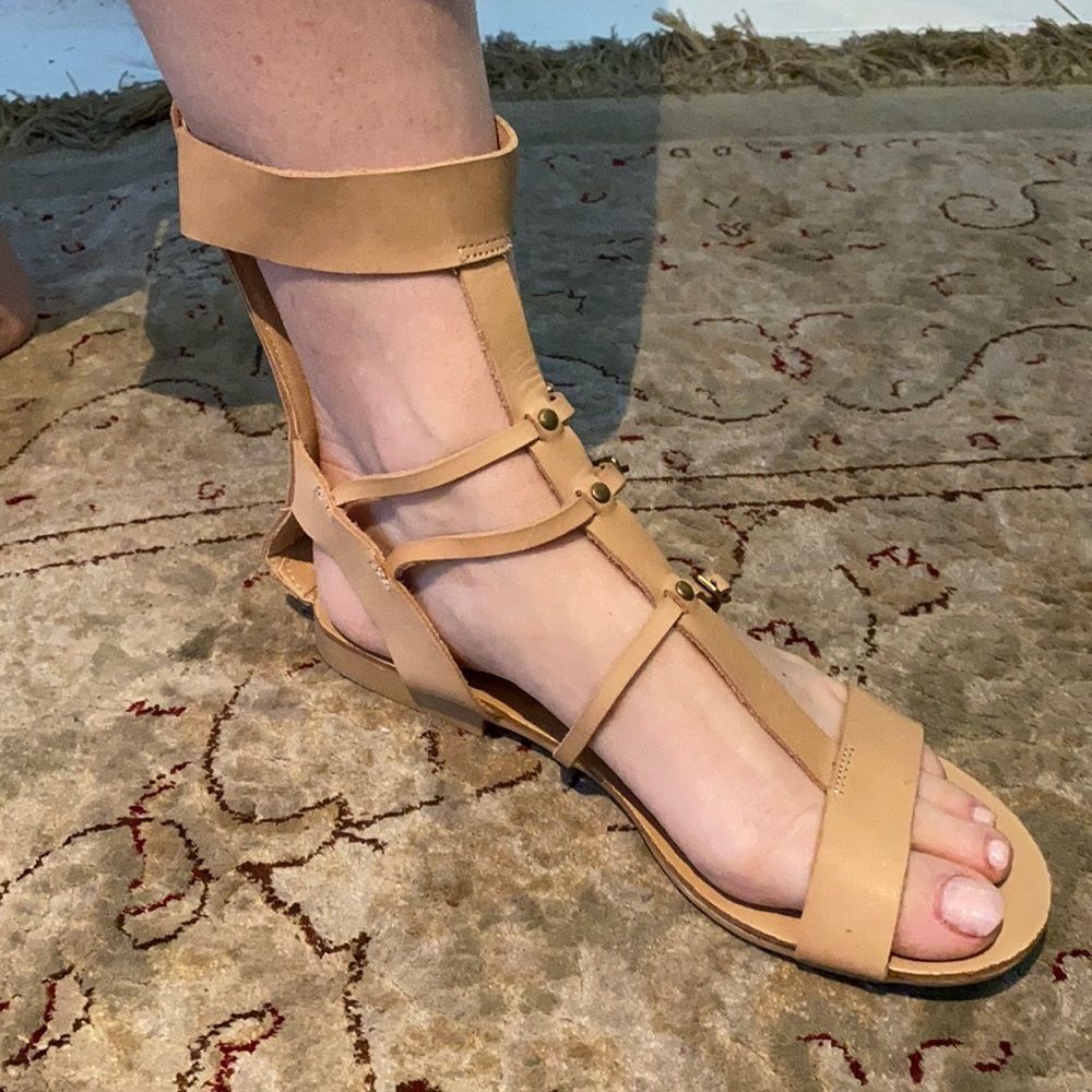 Modern Rebel beige leather gladiator sandals.
